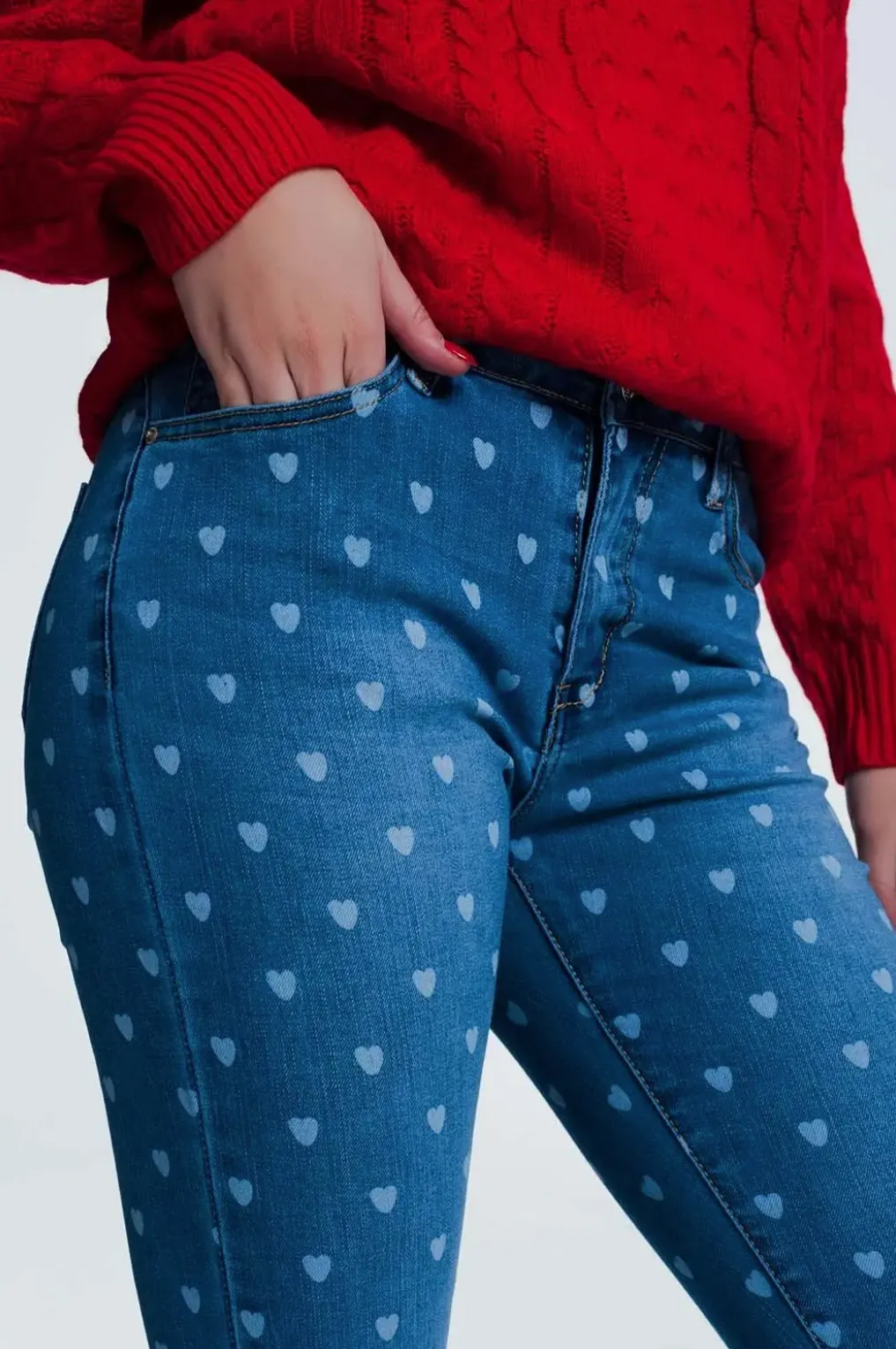 MID-RISE HEART-PRINT SKINNY JEANS